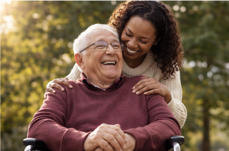 Caregiver with senior smiling outdoors